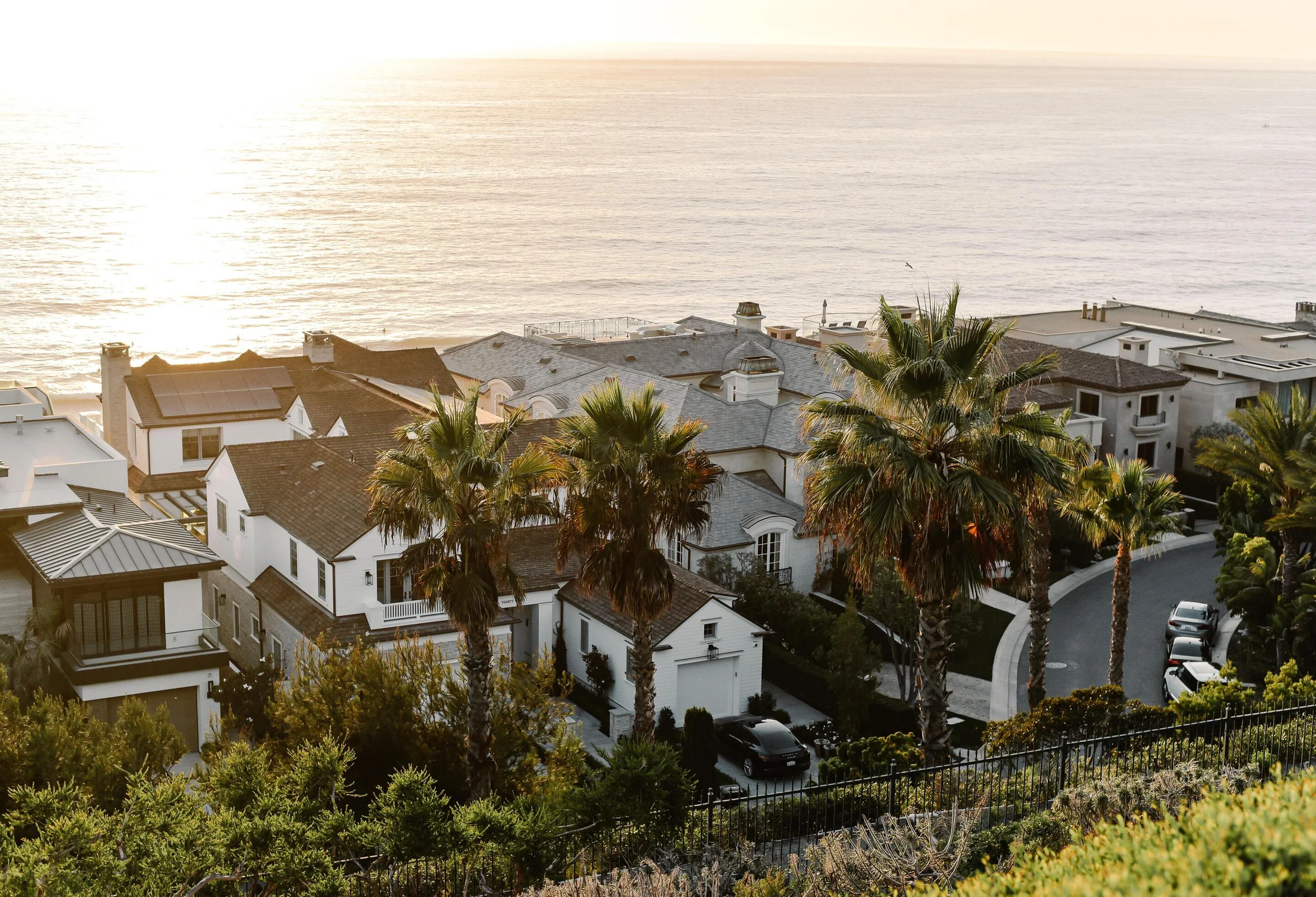 White coastal homes overlooking the Pacific